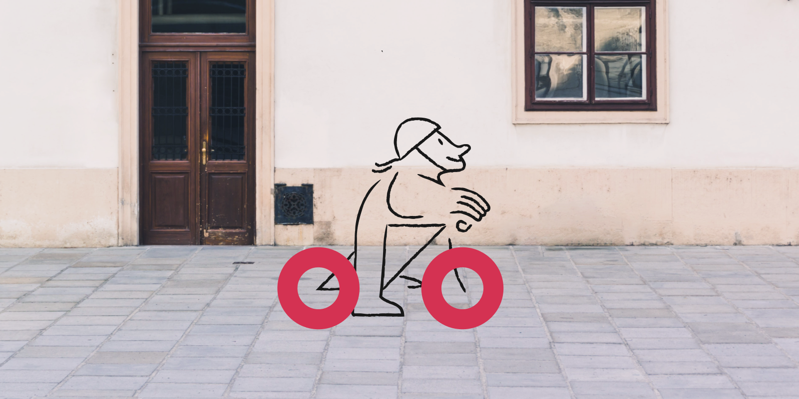 Silueta montando en bicicleta con el logo de dōcō